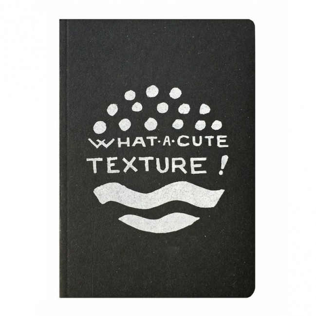 Carnet "What a cute texture!", couverture noire et intérieur en papier noir.
